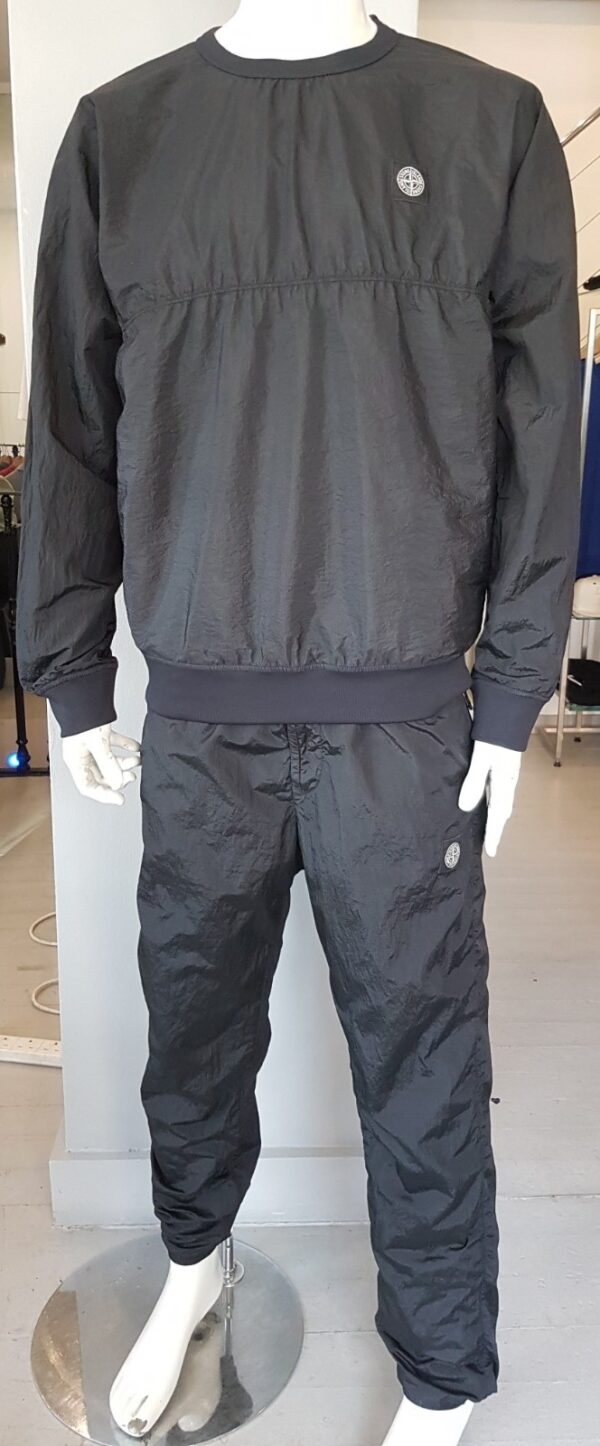 Stone Island Softshell Tracksuit in Black, a luxurious pre-loved piece.