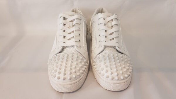 Elegant Christian Louboutin Seavaste 2 Sneakers in White, featuring spikes on toe box and heel.