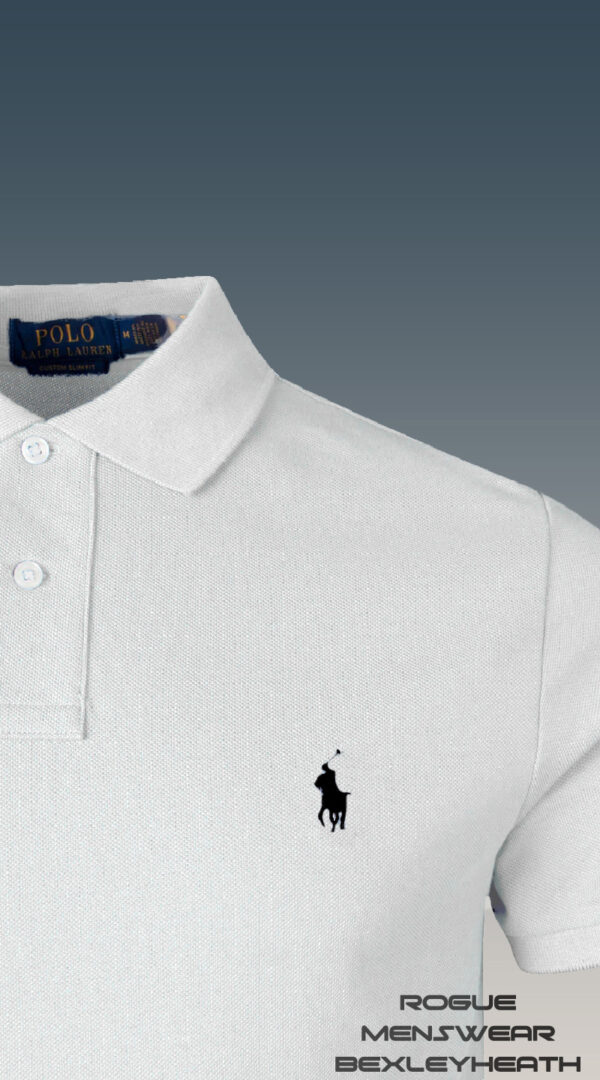 Luxurious Ralph Lauren polo shirt in white with iconic white logo.